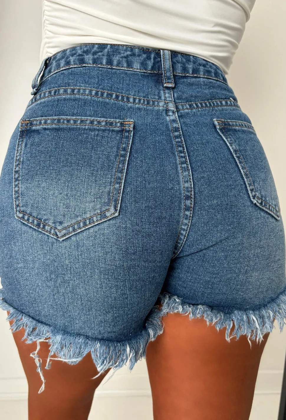 Hold'Em Close Mid Wash Stretch Frayed Cut Off Denim Shorts