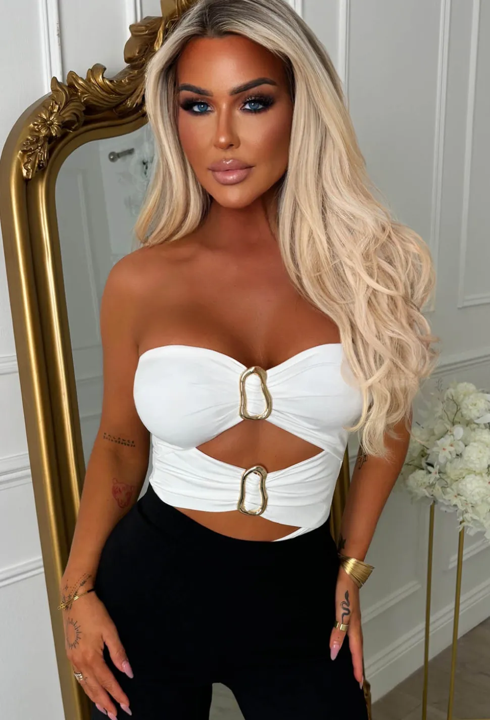 Playful Peekaboo White Cut Out Gold Buckle Bodysuit